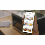 Microonde Candy 31 litri con funzione di cottura intelligente e ricette sull'app mobile