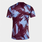 Maglia sportiva uomo Joma con design moderno e colori vivaci, perfetta per il calcio e attività all'aria aperta