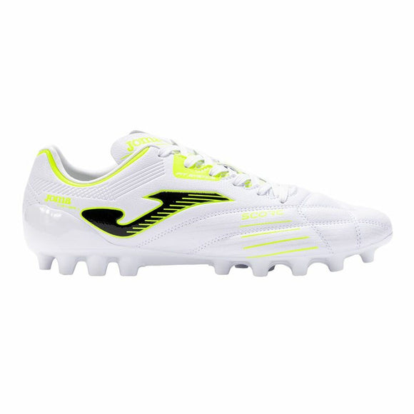 Scarpe da calcio Joma uomo bianche con dettagli neri e giallo fluo, ideali per prestazioni elevate sul campo.