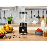 Frullatore Lafe 1,5 litri nero su un tavolo con frutta fresca e ingredienti per smoothie