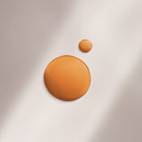 Olio solare protettivo Lancaster SPF 30 in texture fluida su fondo chiaro