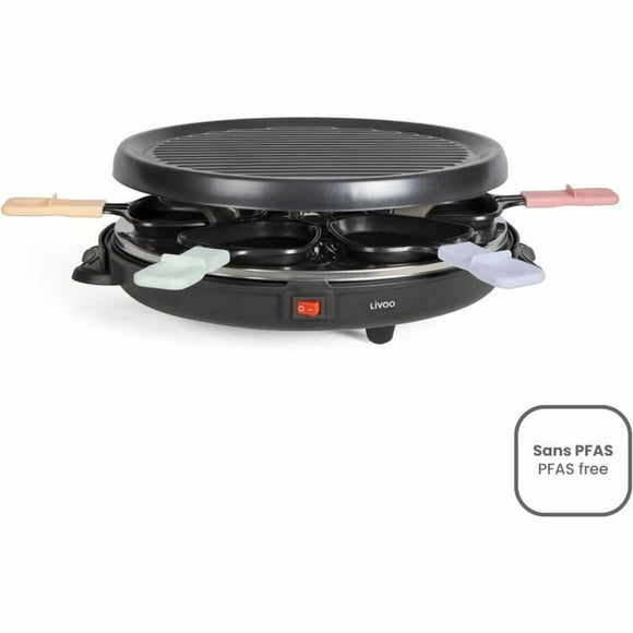 Piastra grill Livoo senza PFAS con design antiaderente e spatole colorate per grigliare cibi in modo sano