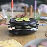 Piastra grill Livoo senza PFAS con verdure grigliate pronte per una cena conviviale
