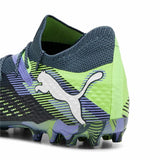 Scarpe da calcio Puma Future 7 Ultimate con design moderno e suola adatta per campi in erba sintetica