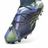 Scarpe da calcio Puma Future 7 Ultimate in blu e verde con suola per campi in erba artificiale