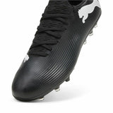 Scarpe da calcio Puma Future 7 uomo nere con design aerodinamico e logo Puma in evidenza
