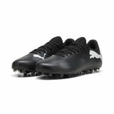 Scarpe da calcio Puma Future 7 uomo in nero con dettagli bianchi e suola per campi in erba naturale