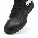 Scarpe da calcio Puma Future 7 uomo in nero con suola per campo erboso e design elegante