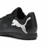 Scarpe da calcio Puma Future 7 uomo in nero con logo Puma bianco e suola perforata per grip ottimale