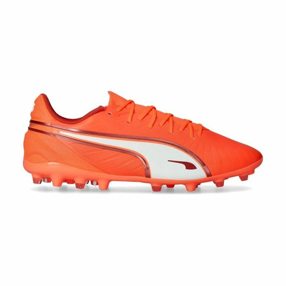 Scarpe da calcio Puma King adulte in arancione con suola adatta per terreni erbosi