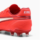 Scarpe da calcio Puma King uomo rosse con suola in gomma e design ergonomico per prestazioni elevate