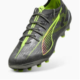 Scarpe da calcio Puma Ultra 5 Ultimate uomo in nero e verde con suola adatta per campi in erba naturale