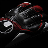 Guanti da portiere Uhlsport Powerline in nero e rosso per un'ottima presa e protezione durante le partite di calcio